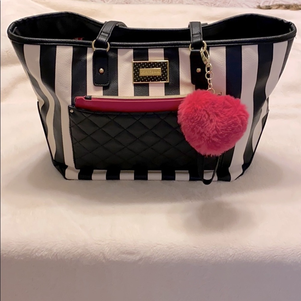 Betsey Johnson tote with wristlet and key chain.